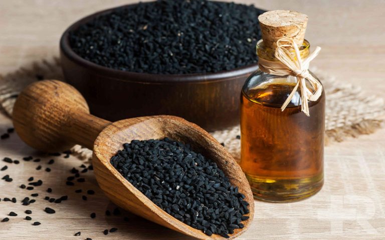 مالیدن روغن سیاه دانه به شکم